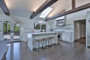 dine-in kitchen stocked with cookware and dinnerware