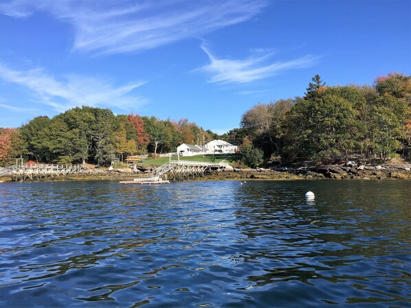 The property in early fall from the water of Linekin Bay