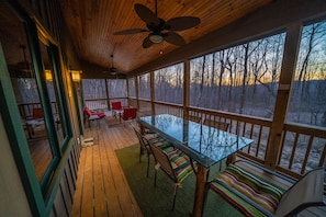 Greet the rising sun (or kick back with a beverage) from our screened-in porch.