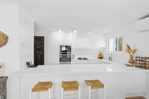 New kitchen with bench stools