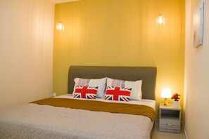 master bedroom with bathroom attached, aircond & fan, wardrobe, side table 