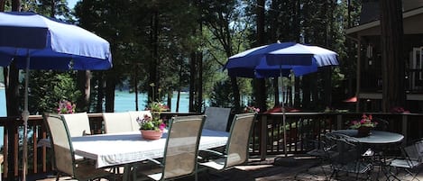 Front deck with complete seating for 12 over looking the lake.