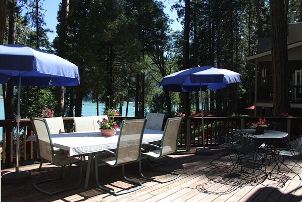 Front deck with complete seating for 12 over looking the lake.