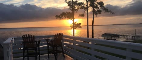 Sunrise from the crows nest upstairs off primary bedroom. The view is worth it!