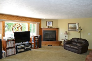 Sunken living room with fireplace 