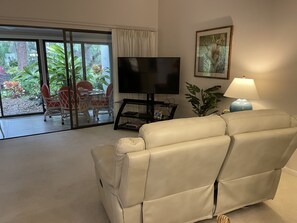 View from dining room into living room and lanai