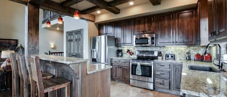 Gourmet kitchen with granite counter tops and stainless appliances!