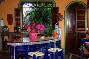Fully stocked kitchen with hand-painted dishes,oven, fridge, blender, microwave
