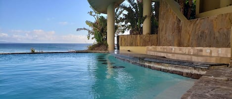 One of the Infinity pools with wet bar  complex pools