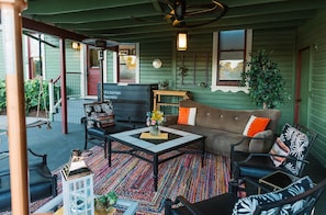 Outdoor covered patio is perfect fresh air gathering spot or sanctuary.