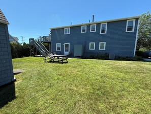 Back Yard with Outdoor Shower, Picnic Table and Shed