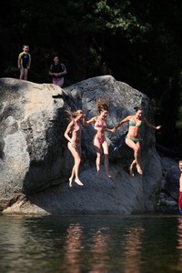 Off the jump rock at the swimming hole