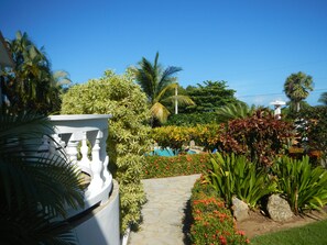 ..walkway through garden... to pool,... and Oceanview Terrace...