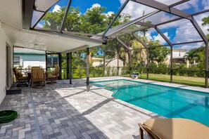 Pool with shallow sitting area.