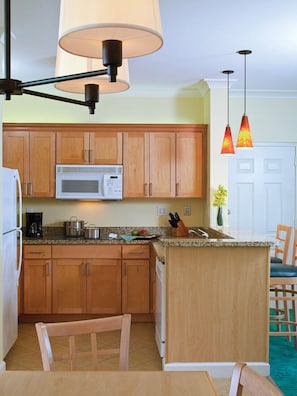 Spacious kitchen, fully equipped with stove, refrigerator, microwave