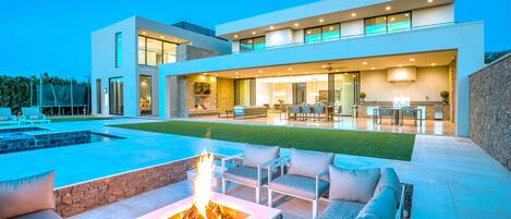 Poolside seating with fire feature