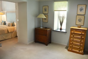 Spacious separate dressing area to bedroom with super king size bed