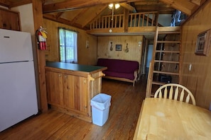 "Ole Pete" tiny home cabin #14 accommodates up to 4 guests.