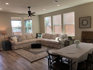 Living Room open to Dining/ Kitchen and Outdoor California Room 