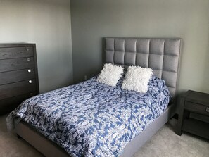 Bedroom with queen mattress