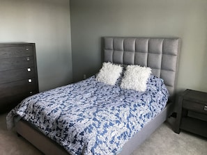 Bedroom with queen mattress