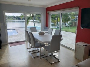 Formal dining area with seating for 6 and extra high chair for the little ones.