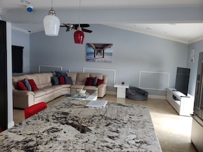Large open kitchen with large open living room.