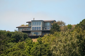 Our home is perched atop the hill of the Upper Hawthorne Canyon with 360 views