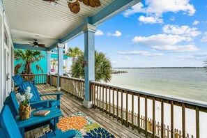 2 HUGE decks overlook the private beach & Santa Rosa Sound & water activities.