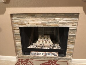 Fireplace for decor only but feel free to turn on battery operated candles.