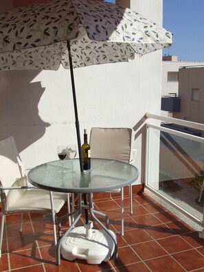 private terrace with patio furniture