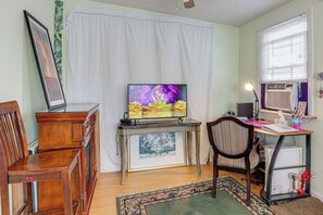 Living Room | Smart TV | Desk | Twin Sleeper Sofa | Window A/C Unit | Fireplace