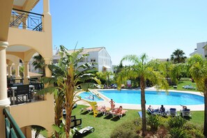 View of the Pool and lawns from balcony.