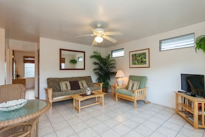 Living Room with Futon Pull Out Couch, TV, Seating