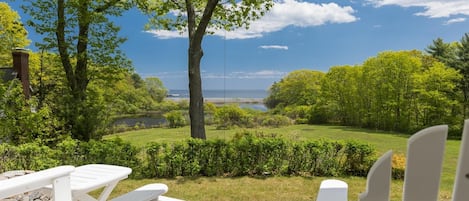 Relax on the back porch and face the ponds and Atlantic Ocean