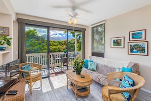 Living Room Area and Lanai in Distance with Views