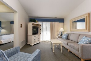 The unit is furnished with a queen-size sleeper sofa and equipped with a smart TV for your entertainment.