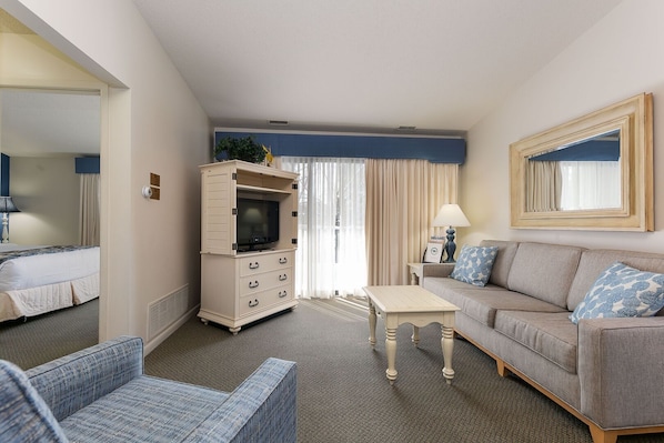 The unit is furnished with a queen-size sleeper sofa and equipped with a smart TV for your entertainment.