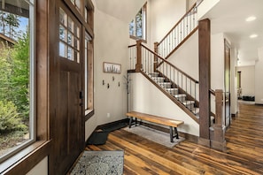 Entryway to hang coats and park shoes.
