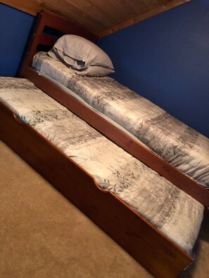 Twin and trundle bed located in upstairs loft!