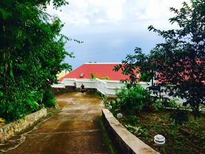 A  private driveway down to the villa gates