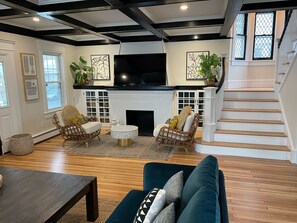 View of living room looking toward main staircase 