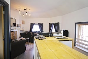 open plan lounge, kitchen, dining