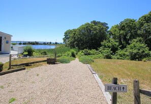 Harbor Village footpath along a tidal estuary to beaches on Nantucket Sound.