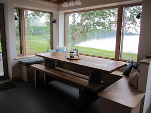 Dining area looking out to cove as the tide is beginning to go out