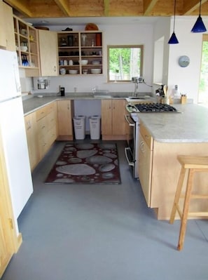 Kitchen view - cove is to the right with view over the stove and counter