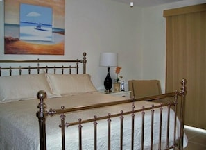 Master Suite Irving Nickel King bed shares this beachfront view !