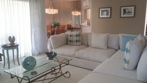 Living Room with Sectional, 3 Glass Doors