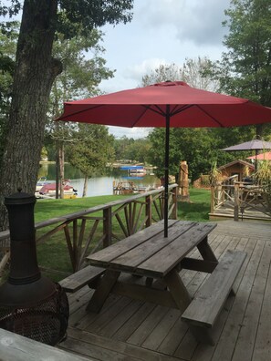 Cabin Two Deck has a picnic table on site.