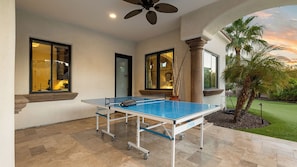 Covered patio with ping pong & scenic views—perfect for outdoor fun!